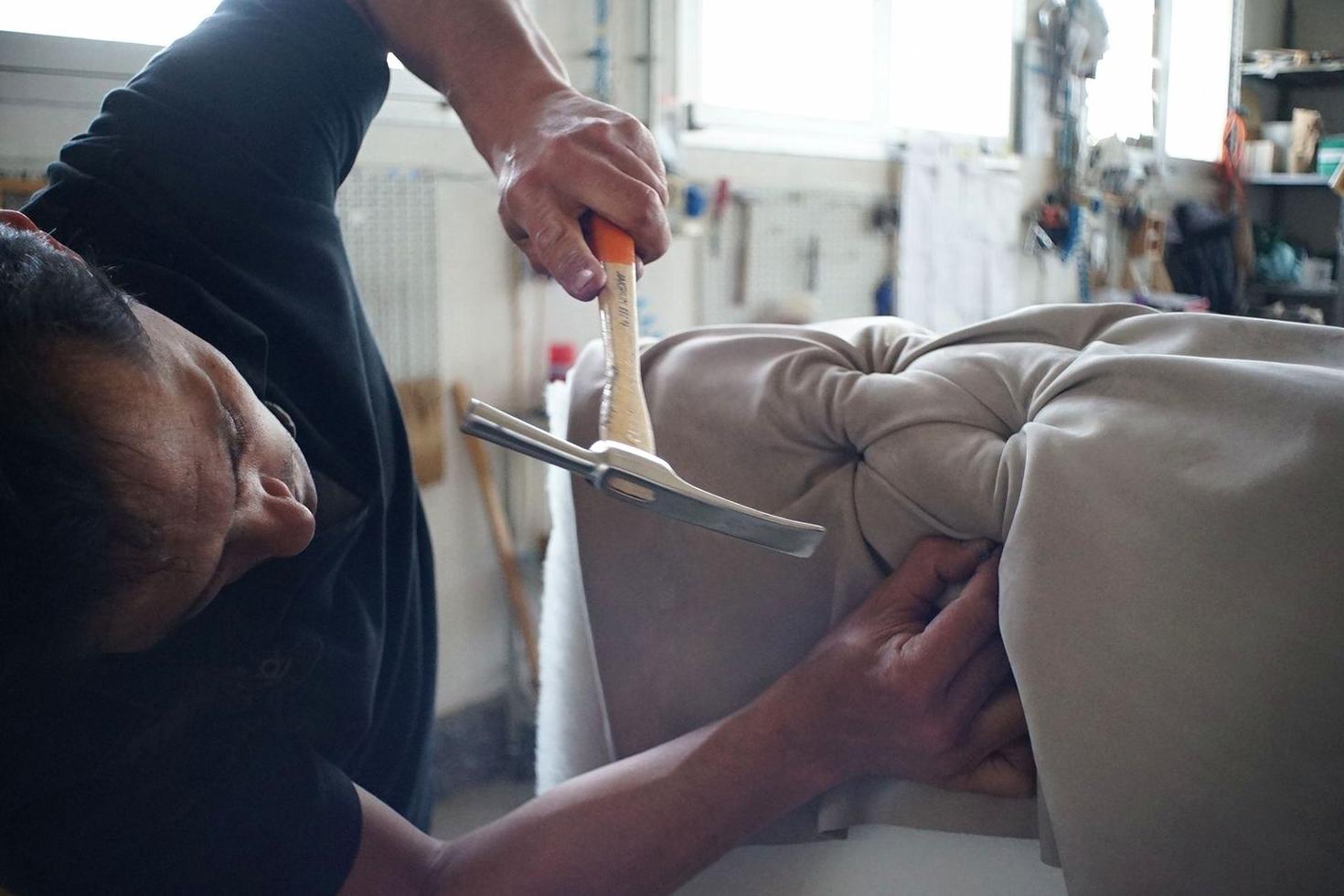 Artisan at work in workshop